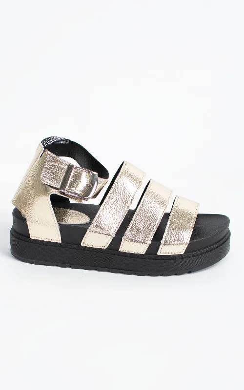 Men's sandals with a decorative buckle or charmDot Platform Sandals | Gold